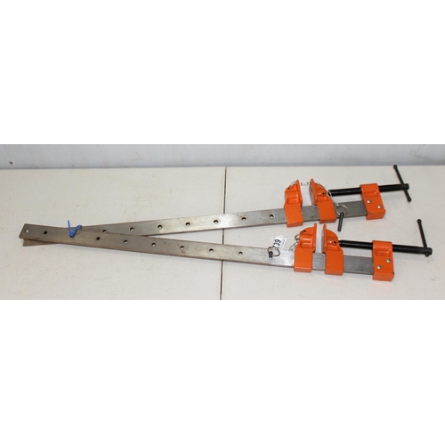 739 - 2 orange sash clamps, approx 80cm long