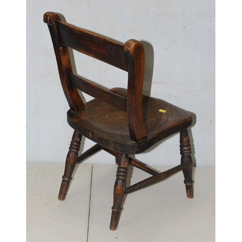 69 - An antique miniature Oxford childs chair with elm seat