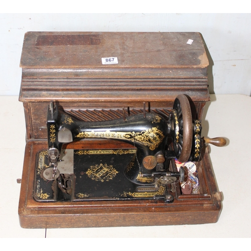 867 - Singer sewing machine in wooden case