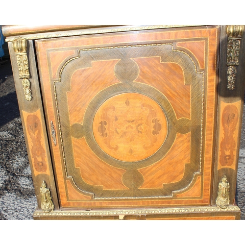 96 - A French Empire style pier cabinet with marquetry inlay, ormolu mounts and green marble top, approx ... 