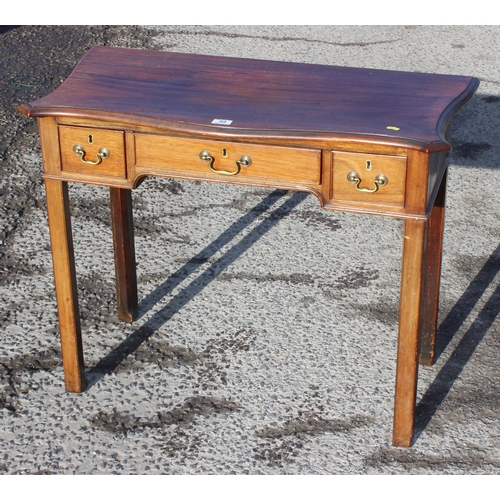 99 - A small antique 3 drawer mahogany writing desk