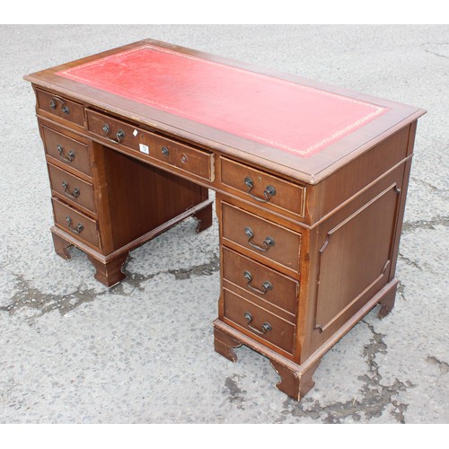 72 - Mahogany effect pedestal desk with red leather top