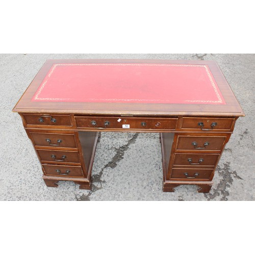 72 - Mahogany effect pedestal desk with red leather top