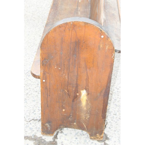 73 - An antique pitch pine church pew, approx 180cm wide