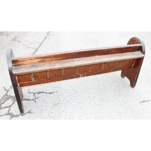 73 - An antique pitch pine church pew, approx 180cm wide