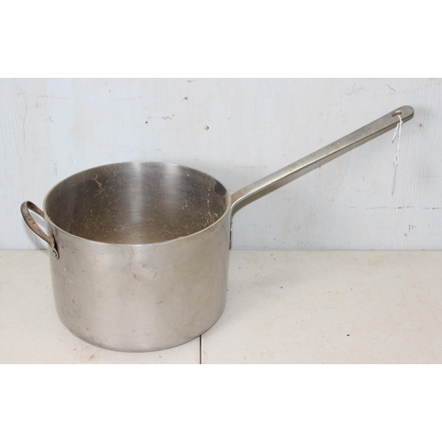 1701 - A large vintage stainless steel sauce pan from New College, Oxford dated 1959