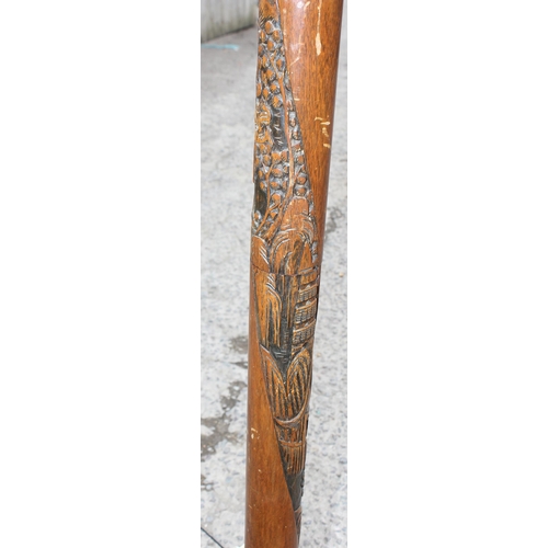 184 - A mid-20th century Chinese style carved wooden standard lamp