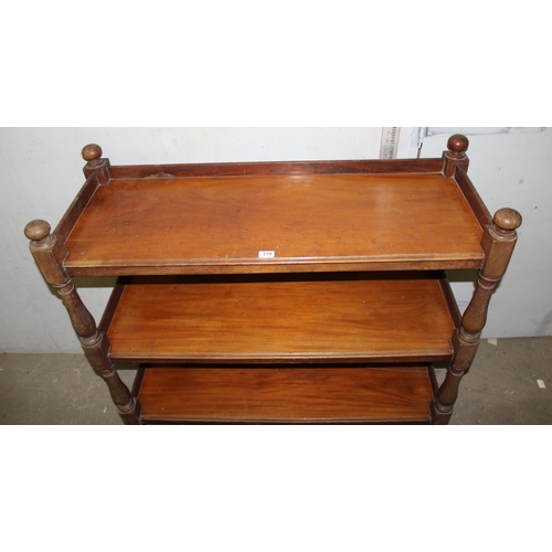 119 - A Victorian mahogany 3 tier buffet stand or dumb waiter, with carved dome shaped finials and raised ... 