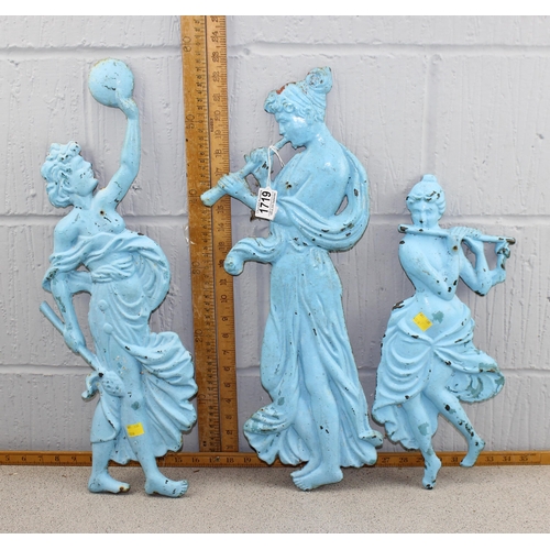 1719 - A trio of unusual antique painted cast iron wall plaques depicting classical female figures, the lar... 