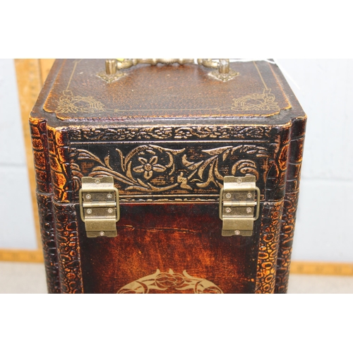 229 - A vintage embossed leather style wine box with handle