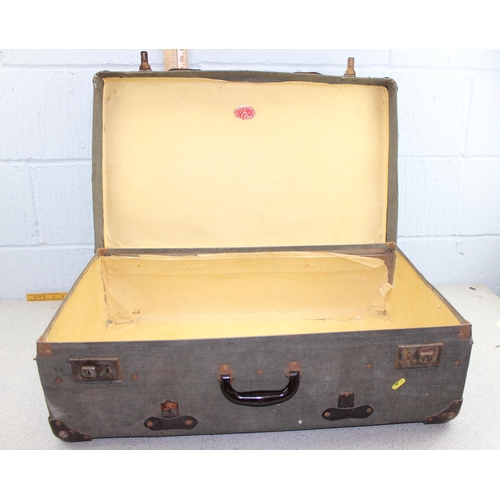 230 - 2 vintage suitcases with labels