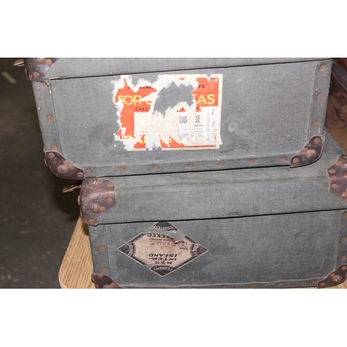 230 - 2 vintage suitcases with labels