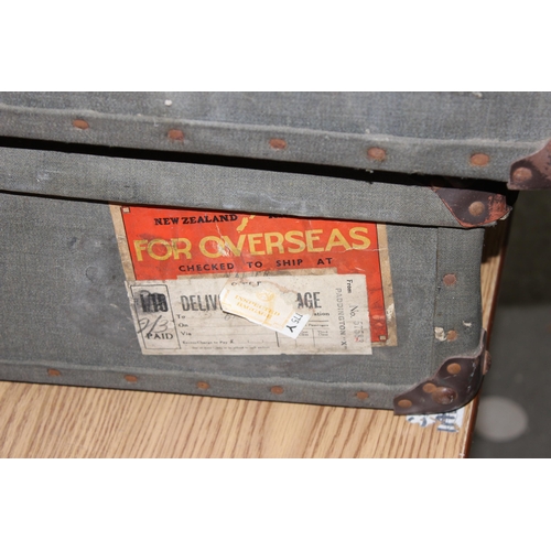 230 - 2 vintage suitcases with labels