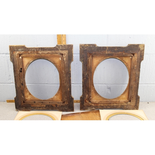 328 - A pair of impressive antique gilt frames with oval mounts, approx 46cm x 41cm