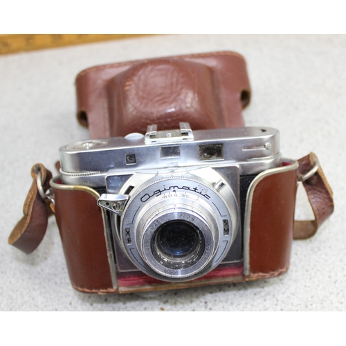 527 - Vintage Agilux camera and various camera odds and films