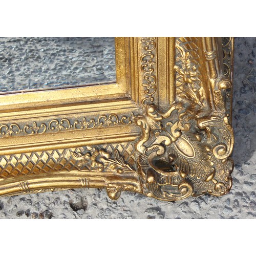 302 - A large antique style gilt framed wall mirror