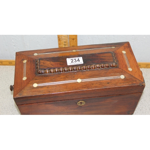 234 - Antique rosewood tea caddy with mother of pearl inlay