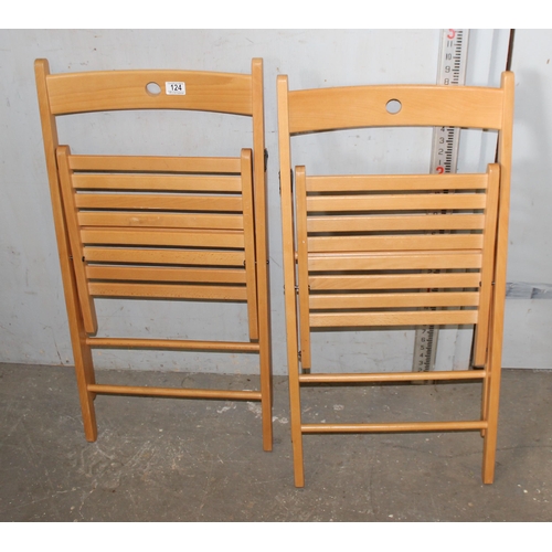 124 - 2 folding wooden chairs