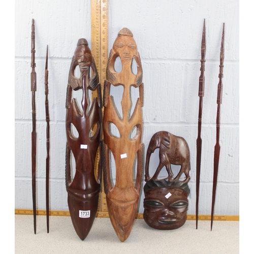 1733 - Qty of African carved wooden items to inc 3 masks, wooden spears etc etc