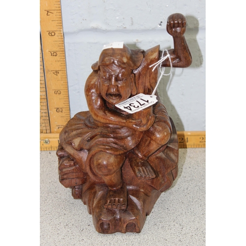 1734 - A vintage Chinese carved wooden statue of a seated male with goblet