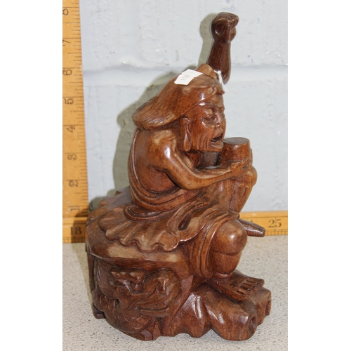1734 - A vintage Chinese carved wooden statue of a seated male with goblet
