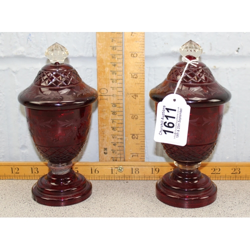 1611 - A pair of antique ruby flashed Bohemian glass urns with lids and engraved decoration, one with old r... 