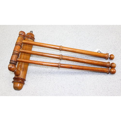 239 - An antique bamboo effect wooden towel rail