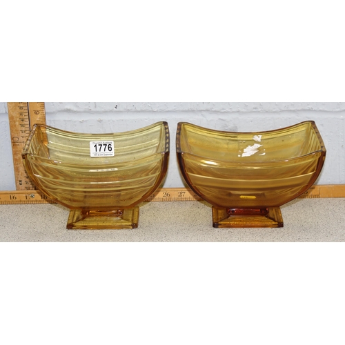 1776 - A pair of Art Deco period amber glass bowls