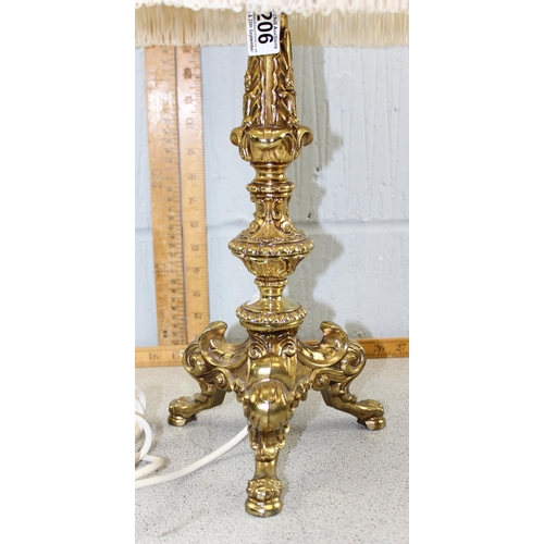 206 - A Rococo style gilt metal table lamp with shade