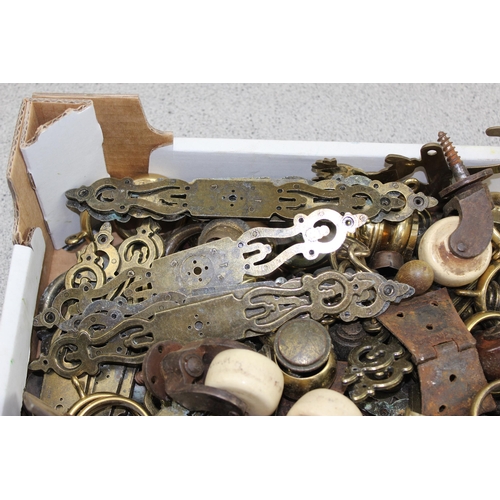 241 - A large qty of assorted antique and later furniture fittings, many brass, to inc castors etc etc