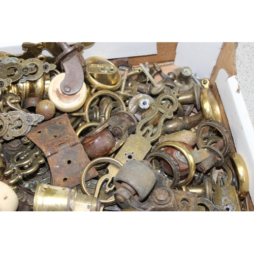 241 - A large qty of assorted antique and later furniture fittings, many brass, to inc castors etc etc