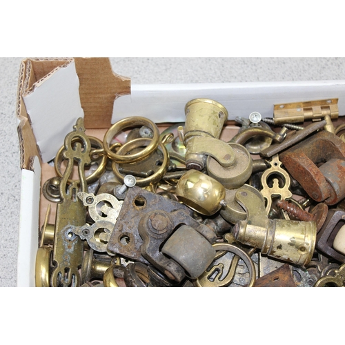 241 - A large qty of assorted antique and later furniture fittings, many brass, to inc castors etc etc