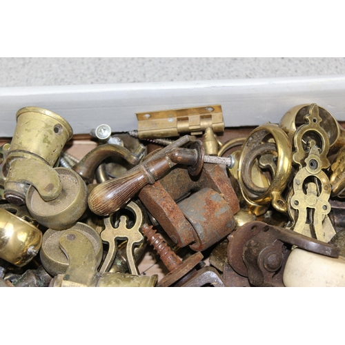 241 - A large qty of assorted antique and later furniture fittings, many brass, to inc castors etc etc