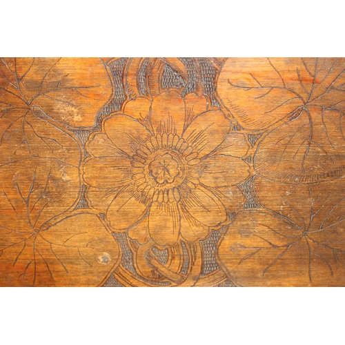 242 - An Arts & Crafts period pokerwork wooden tray decorated with flowers