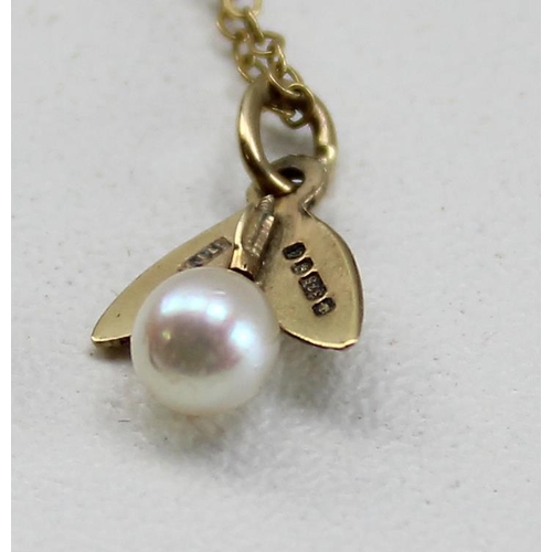 1222 - 9ct gold and seed pearl pendant on 9ct gold chain, approx 1.46g gross