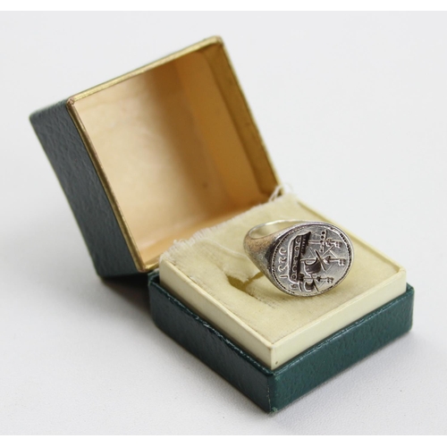 1226 - An unusual silver signet ring depicting a galleon and the date 1520, in Ashmolean Museum, Oxford box... 