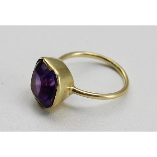 1228 - An 18ct gold and amethyst ring, unmarked but XRF tested, approx size N & 3.72g gross, believed to be... 