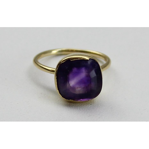 1228 - An 18ct gold and amethyst ring, unmarked but XRF tested, approx size N & 3.72g gross, believed to be... 