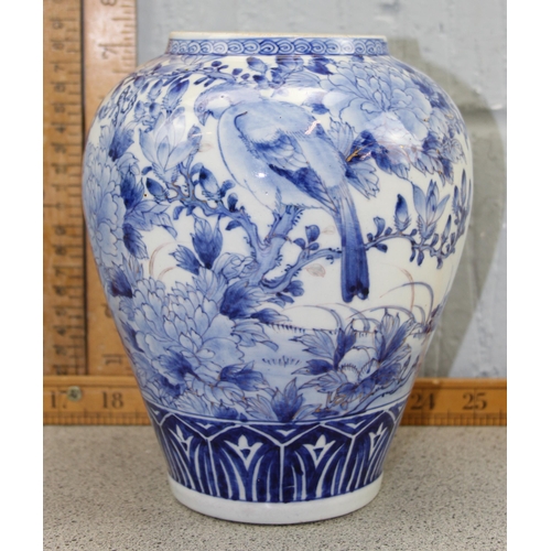 1668 - An antique Japanese blue & white vase decorated with birds and flowers, 6 character mark to the base... 