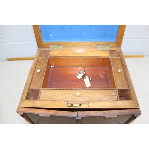 248 - An antique table top collectors cabinet with various drawers and turned bone handles, with 2 keys an... 