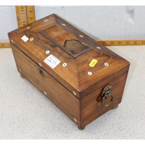 249b - A 19th century Rosewood sarcophagus shaped tea caddy with mother of pearl inlay