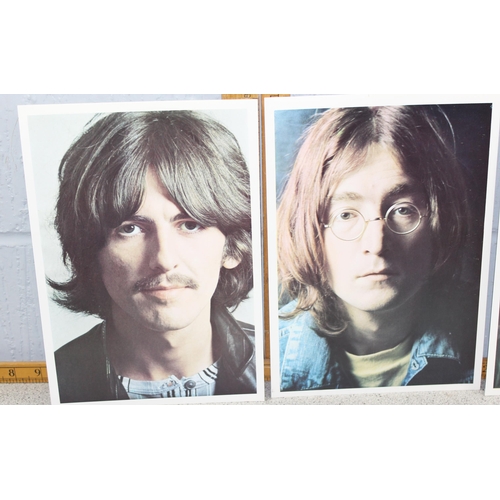 489 - 4 vintage portrait prints of The Beatles