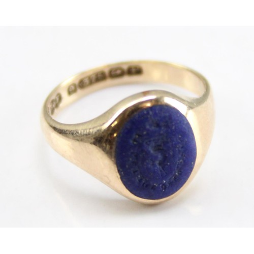 1229 - A 9ct gold signet ring with blue stone intaglio seal, believed to be Lapis, marked for Birmingham 19... 