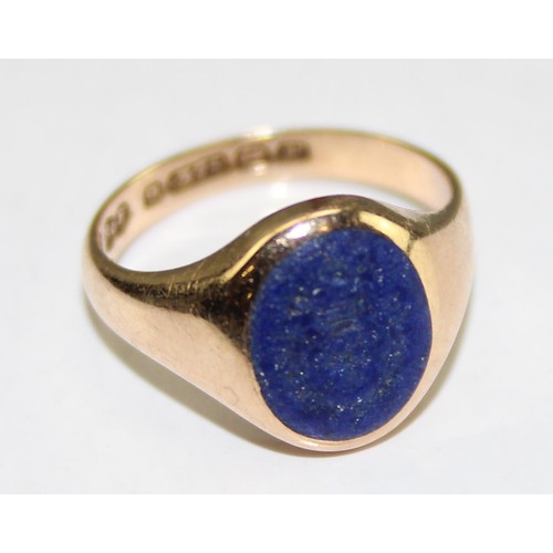 1229 - A 9ct gold signet ring with blue stone intaglio seal, believed to be Lapis, marked for Birmingham 19... 