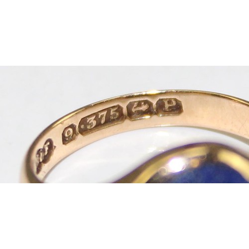 1229 - A 9ct gold signet ring with blue stone intaglio seal, believed to be Lapis, marked for Birmingham 19... 