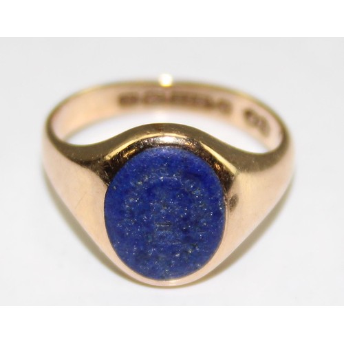 1229 - A 9ct gold signet ring with blue stone intaglio seal, believed to be Lapis, marked for Birmingham 19... 