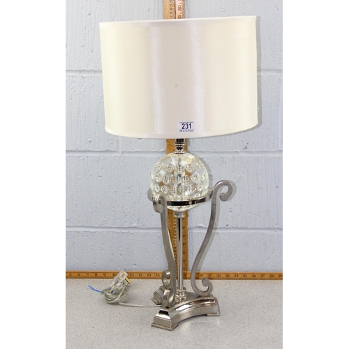 231 - A large glass and decorative metal table lamp with shade