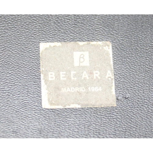 270 - A large stiff cow hide bag or basket by Becara of Madrid