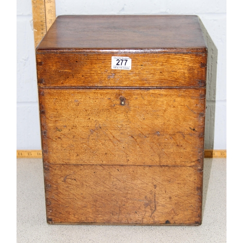 277 - A large antique oak box with brass drop handles