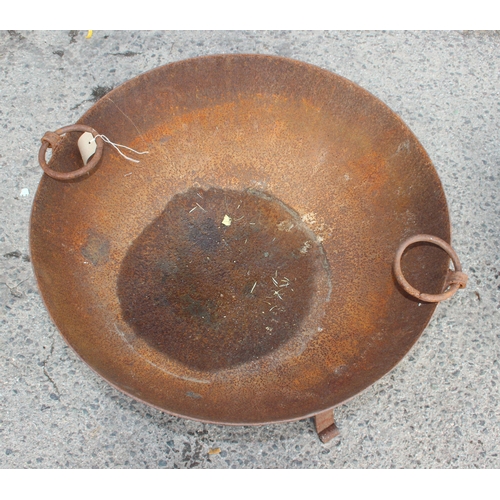 301 - A large metal fire pit or brazier